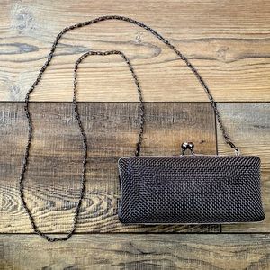 Stylish black and silver metal box purse with two different strap lengths